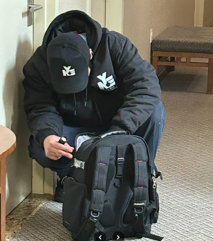 Branded NYE technician servicing a commercial office, NYC
