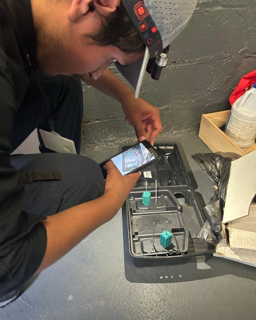 NYE technician dating a glue monitor on a kitchen floor