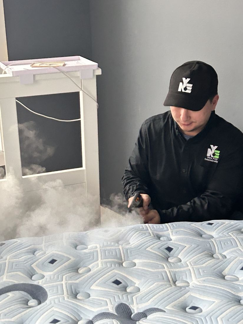 NYE technician steam-treating a mattress seam
