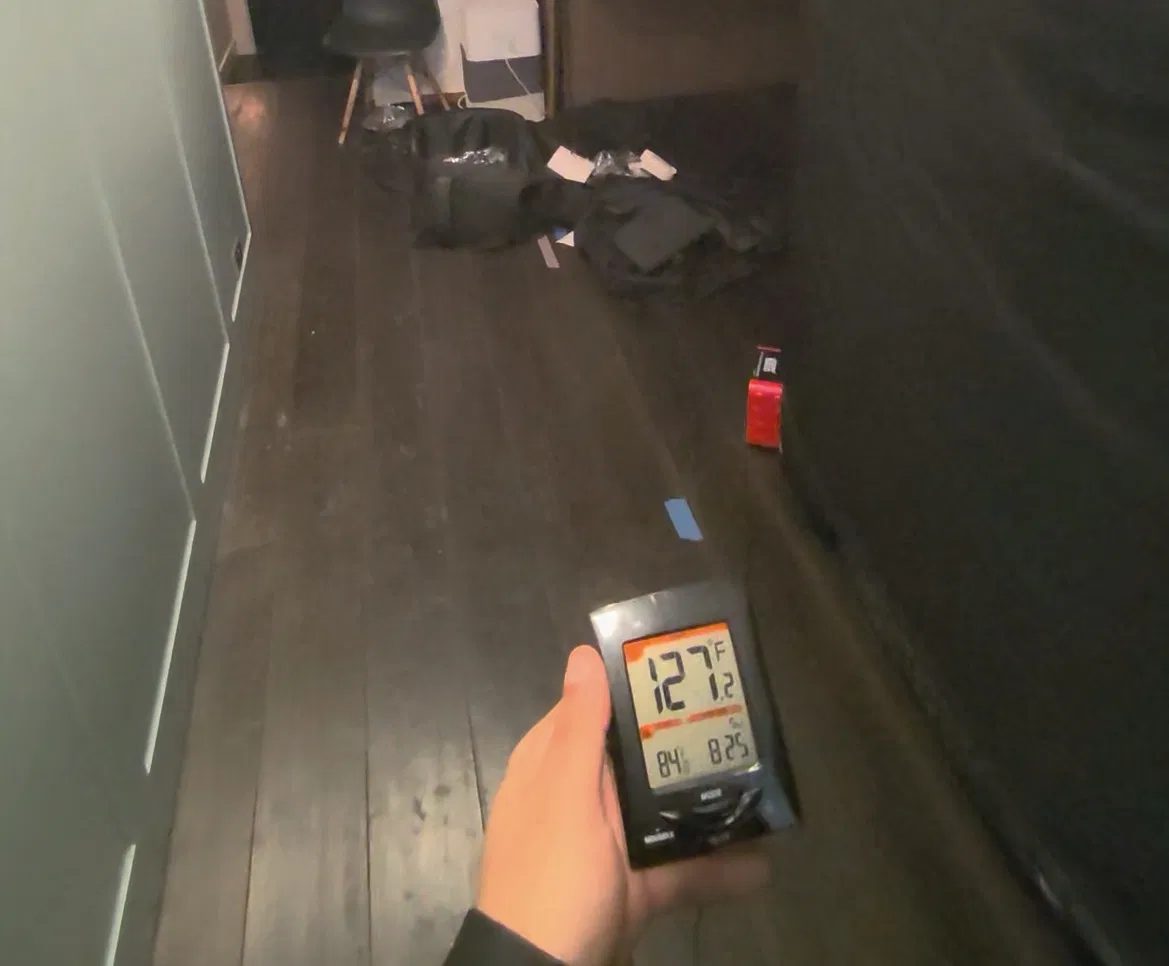 Probe thermometer reading 127.2 degrees Fahrenheit inside a garment load