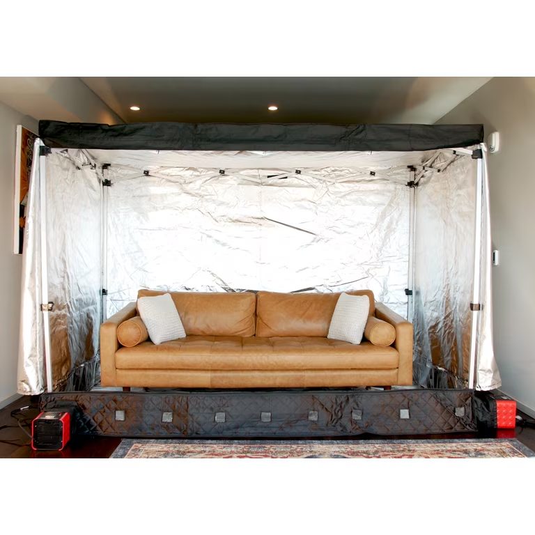 Leather sofa inside a ZappBug Room portable heat chamber